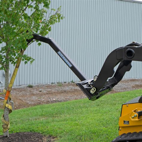 boom lift for skid steer|skid steer tree boom attachment.